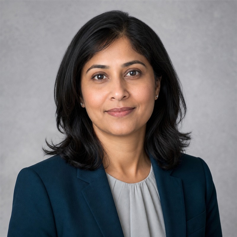 Professional headshot of Mina Patel